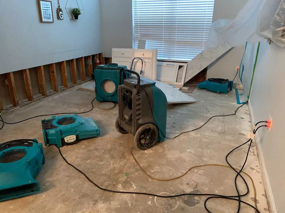 Dehumidifier in flood-cut room for Water Damage Restoration in Winter Gardens